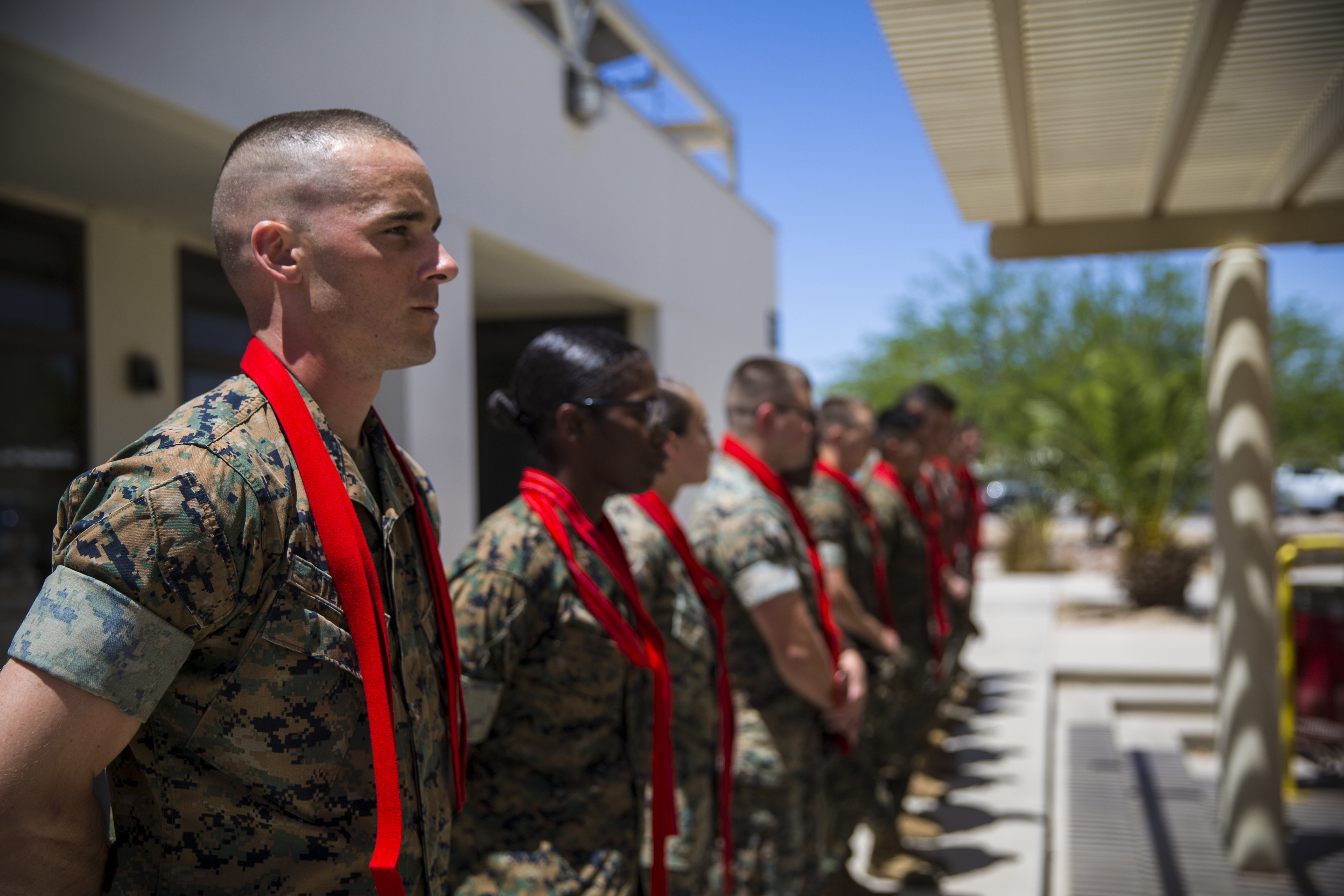 Marines receiving their blood stripes